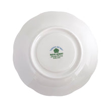 Load image into Gallery viewer, Vintage Avon shaped Forget-Me-Not bone china teacup and saucer, features a scalloped edge with hand painted blue flowers and gold gilt rim. Royal Albert, England, 1950s. In excellent condition, free from chips, cracks and repairs. Makers marks present. Teacup measures 3 1/4 x 2 3/4 inches | Saucer measures 5 1/2 inches