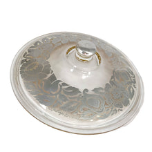 Load image into Gallery viewer, Vintage clear Fire-King 2 quart lidded casserole with a stunning floral silver overlay by Georges Briard for Anchor Hocking, USA, circa 1960s.
In as found vintage condition with a minor chip to the inner rim of the casserole and wear to the silver. The lid is in excellent condition, no chips or wear.
Measures 10 x 5 1/2 inches
Capacity 2 quarts