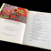 Load image into Gallery viewer, Vintage mid-century Gifts to Make Yourself, hardcover book. Its 208 pages contains a range of projects from fabric to food. Published by Meredith Corporation, USA, copyright 1972, first edition, fourth printing, 1974. The bound hardcover book is in excellent condition and the interior pages have typical age-related yellowing. Previous owners name marked in ink.
