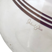 Load image into Gallery viewer, Vintage MCM glass coffee carafe features copper stripes, a black atomic-age bakelite handle, copper cork stopper and metal beauty bowl warmer stand. Crafted by Inland Glass, USA, 1950s. A fabulous mid-century serving piece for yourself or to give as a gift!
In excellent condition. New in box with tags, instructions and 2 candles.
Measures 6 x 9 1/2 inches, spout 2 1/8 inches