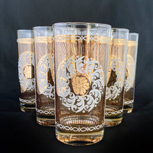 Load image into Gallery viewer, Stunning set of eight Vintage mid-century luxury highball glass tumblers, decorated with a 24 karat gold starburst, gold floral decorative white sugar texture wreath, a gold border overlayed with an atomic pattern, also in white sugar texture. Crafted by the talented designers of the Libbey Glass Company, USA, circa 1950s/60s. These beauties will add an exquisite touch to any occasion - indulge your guests with these truly special cocktail glasses.