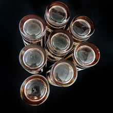 Load image into Gallery viewer, Stunning set of eight Vintage mid-century luxury highball glass tumblers, decorated with a 24 karat gold starburst, gold floral decorative white sugar texture wreath, a gold border overlayed with an atomic pattern, also in white sugar texture. Crafted by the talented designers of the Libbey Glass Company, USA, circa 1950s/60s. These beauties will add an exquisite touch to any occasion - indulge your guests with these truly special cocktail glasses.