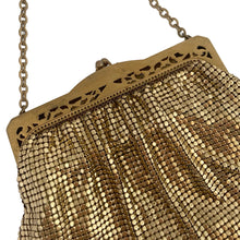 Load image into Gallery viewer, Gorgeous vintage art deco style gold toned metal mesh evening bag, lined with peachy-clay coloured fabric with pocket, kiss closure with filigree and decorative serpentine chain handle. Crafted by Whiting and Davis, USA, circa 1940s/1950s. A wonderful period piece that would make an fabulous accessory and perfect prop for photography, TV or movies!
Measures 7 3/4 x 5 1/2 inches