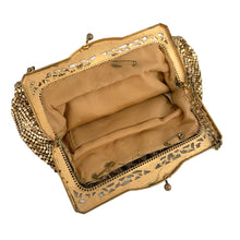 Load image into Gallery viewer, Gorgeous vintage art deco style gold toned metal mesh evening bag, lined with peachy-clay coloured fabric with pocket, kiss closure with filigree and decorative serpentine chain handle. Crafted by Whiting and Davis, USA, circa 1940s/1950s. A wonderful period piece that would make an fabulous accessory and perfect prop for photography, TV or movies!
Measures 7 3/4 x 5 1/2 inches