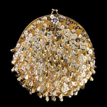 Load image into Gallery viewer, Stunning handmade vintage mid-century era evening bag adorned in bright gold teardrop and glass seed beads, sequins, topped with gold-toned hardware, rope chain handle and kiss closure. The interior is lined with yellow satin and has an open pocket. The bag is large enough for a small cell phone, credit cards/cash, compact/lipstick. Crafted by Kaiho, Macau, 1960s. An absolutely stunning piece that would make an a versatile fashion accessory which may be worn as a shoulder bag, a crossbody bag or a clutch.