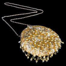 Load image into Gallery viewer, Stunning handmade vintage mid-century era evening bag adorned in bright gold teardrop and glass seed beads, sequins, topped with gold-toned hardware, rope chain handle and kiss closure. The interior is lined with yellow satin and has an open pocket. The bag is large enough for a small cell phone, credit cards/cash, compact/lipstick. Crafted by Kaiho, Macau, 1960s. An absolutely stunning piece that would make an a versatile fashion accessory which may be worn as a shoulder bag, a crossbody bag or a clutch.