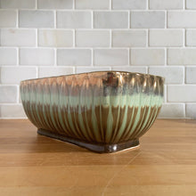 Load image into Gallery viewer, Stunning rectangular ceramic pottery planter with a striking vertical leaf motif finished with a coppery gold and turquoise and brown drip glaze with deep brown interior. Crafted by Lefton, Japan, circa 1950s. In excellent condition, free from chips/cracks/repairs. Marked "ESD JAPAN, HAND PAINTED. JA7129". Measures 9 x 4 1/2 x 4 1/2 inches