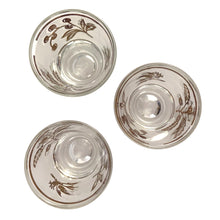 Load image into Gallery viewer, Vintage mid-century shot glasses featuring gold birds and botanicals on a frosted band with gold bands! Perfect to dress up a bar cart, bottoms up!
All pieces are in good vintage condition, no chips or cracks.
Each glass measures 1 5/8 x 2 1/2 inches
Capacity 1 ounce