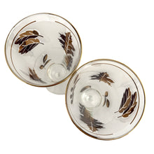 Load image into Gallery viewer, If you're a fan of the TV series, Mad Men, then you'll dig these fabulous "Golden Foliage" pilsner or champagne glasses. Crafted by the Libbey Glass Company, circa 1960/70s. Covered in gold leaves on a frosted band bordered with gold bands. These beauties would be a fabulous addition to your barware collection and will definitely amp up the glam of any bar cart. In excellent vintage condition, free from chips or wear. They look brand new!