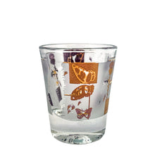 Load image into Gallery viewer, This vibrant vintage mid-century clear shot glass features a delightful pattern of 22kt gold butterflies, thistles and botanicals on a frosted band. Designed by Fred Press, USA, circa 1960s. A stunning addition to your luxury barware collection!
In excellent condition, no chips. Minor wear commensurate with age.
Measures 8 1/2 inches tall