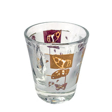 Load image into Gallery viewer, This vibrant vintage mid-century clear shot glass features a delightful pattern of 22kt gold butterflies, thistles and botanicals on a frosted band. Designed by Fred Press, USA, circa 1960s. A stunning addition to your luxury barware collection!
In excellent condition, no chips. Minor wear commensurate with age.
Measures 8 1/2 inches tall