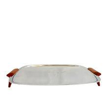 Load image into Gallery viewer, Straight out of the atomic age, this vintage "Gourmates" chrome serving tray features ochre Bakelite handles/legs. Crafted by Glo-Hill, Canada, circa 1960s. Delivers loads of mid-century modern style to entertaining! In great vintage condition with surface wear, but still super shiny. Measures 11 1/8 x 12 1/4 inches (incl. handles)