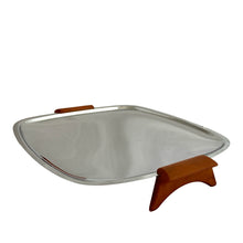 Load image into Gallery viewer, Straight out of the atomic age, this vintage "Gourmates" chrome serving tray features ochre Bakelite handles/legs. Crafted by Glo-Hill, Canada, circa 1960s. Delivers loads of mid-century modern style to entertaining! In great vintage condition with surface wear, but still super shiny. Measures 11 1/8 x 12 1/4 inches (incl. handles)