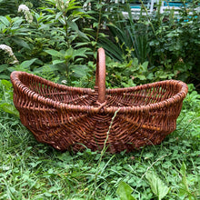 Load image into Gallery viewer, Vintage handmade natural grapevine handled basket. Made in Poland. A beautiful basket for fruit or flower picking. Lends itself nicely to farmhouse, cottage and shabby chic decor. In excellent condition with original sticker. Measures 18 3/4 x 11 x 11