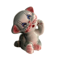 Load image into Gallery viewer, This hand painted ceramic gray and pink kitty cat salt shaker is single and ready to mingle! She is a little salty and is looking for a peppery mate. Available for all meals. No cork. Made in Japan.
In excellent condition, no chips or cracks.
Measures 2 1/8 x 2 x 2 3/4 inches