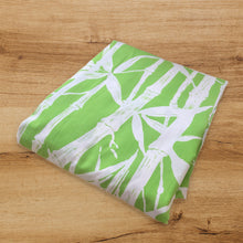 Load image into Gallery viewer, Vintage Ultracale Bamboo fitted king size poly cotton bed sheet featuring a pattern of white bamboo botanicals on green ground. Crafted by Wamsutta, USA, 1977. This fabulous tiki pattern makes a beautiful complement to Hollywood Regency, coastal and cottagecore style bedroom decor. Easily repurpose for crafting, quilting or dressmaking.
In excellent vintage condition, no stains/tears. Colours are vibrant and elastic intact!