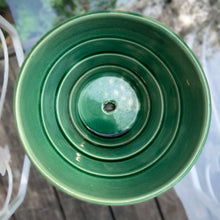 Load image into Gallery viewer, Highly collectible vintage mid-century green basketweave ceramic art pottery planter with attached underplate. Crafted by McCoy Pottery, USA, 1950s. The perfect home for your favourite houseplant or succulent. Makes a lovely gift for any gardening enthusiast.
In excellent vintage condition, no chips/cracks/repairs, age-related crazing. Maker's mark.
Measures 5 1/4 x 4 7/8 inches