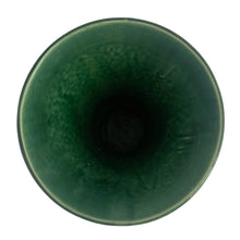 Load image into Gallery viewer, Vintage mid-century gloss green trumpet vase with curled handles. Crafted by McCoy Pottery, late 1950s. This lovely vase is must for any art pottery collector!
In excellent condition, no chips/cracks/repairs, crazing commensurate with age, typical manufacturing glaze pops. Maker's mark on the bottom.
Measures 6 1/4 x 5 7/8 x 8 inches