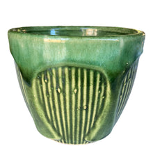 Load image into Gallery viewer, Front view of Robinson Ransbottom forest green drip glaze stoneware planter with embossed fan-shaped gothic panel, 1930s