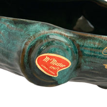 Load image into Gallery viewer, Vintage souvenir green drip glaze figural log redware planter with Ontario Canada written in gold. Crafted by McMaster Craft, Canada, circa 1970s. Perfect to use as intended or repurpose as a candy or trinket dish.
Excellent condition, no chips, cracks or repairs. Original sticker.
Creamer measures 9 x 4 1/2 x 3 3/8 inches
