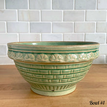 Load image into Gallery viewer, Antique green glazed stoneware 2 quart mixing bowl featuring a basketweave and fan pattern. Crafted by Robinson Ransbottom, USA, 1920s. A well-crafted piece of vintage stoneware offering a nostalgic vibe to your farmhouse or cottage kitchenware and decor!
Bowl #1 is in as found vintage condition, no chips/cracks/repairs, age-related crazing and glaze pops. Crown 8 mark.
Measure 8 1/4 x 4 3/8 inches