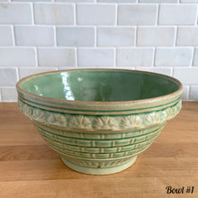 Load image into Gallery viewer, Antique green glazed stoneware 2 quart mixing bowl featuring a basketweave and fan pattern. Crafted by Robinson Ransbottom, USA, 1920s. A well-crafted piece of vintage stoneware offering a nostalgic vibe to your farmhouse or cottage kitchenware and decor!
Bowl #1 is in as found vintage condition, no chips/cracks/repairs, age-related crazing and glaze pops. Crown 8 mark.
Measure 8 1/4 x 4 3/8 inches