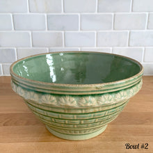 Load image into Gallery viewer, Antique green glazed stoneware 2 quart mixing bowl featuring a basketweave and fan pattern. Crafted by Robinson Ransbottom, USA, 1920s. A well-crafted piece of vintage stoneware offering a nostalgic vibe to your farmhouse or cottage kitchenware and decor!
Bowl #2 is in excellent vintage condition, no chips/cracks/repairs, age-related crazing and glaze pops. Crown 8 mark.
Measure 8 1/4 x 4 3/8 inches