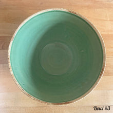 Load image into Gallery viewer, Antique green glazed stoneware 2 quart mixing bowl featuring a basketweave and fan pattern. Crafted by Robinson Ransbottom, USA, 1920s. A well-crafted piece of vintage stoneware offering a nostalgic vibe to your farmhouse or cottage kitchenware and decor!
Bowl #1 is in as found vintage condition, no chips/cracks/repairs, age-related crazing and glaze pops. Crown 8 mark.
Measure 8 1/4 x 4 3/8 inches