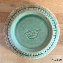 Load image into Gallery viewer, Antique green glazed stoneware 2 quart mixing bowl featuring a basketweave and fan pattern. Crafted by Robinson Ransbottom, USA, 1920s. A well-crafted piece of vintage stoneware offering a nostalgic vibe to your farmhouse or cottage kitchenware and decor!
Bowl #1 is in as found vintage condition, no chips/cracks/repairs, age-related crazing and glaze pops. Crown 8 mark.
Measure 8 1/4 x 4 3/8 inches
