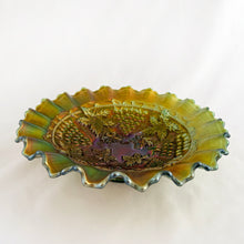 Load image into Gallery viewer, Antique Grape and Cable iridescent green carnival glass bowl featuring a basketweave pattern on the exterior, a smooth sawtooth ruffled pie crust edge and collar base. Crafted by Northwood Glass Company, USA, early 1900s. A lovely vintage piece to display or use as a candy dish!
In excellent condition, no chips. Marked on the bottom with Northwood N with underline inside a circle.
Measures 8 3/8 x 2 1/4 inches