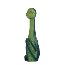 Load image into Gallery viewer, Rare vintage art deco figural smiling and wide eyed seated monkey ceramic long neck flask or decanter, glazed in green and navy blue. Crafted by Schafer and Vater, Germany, circa 1930s. This decanter is reminiscent of a Dr. Seuss-like character, and would be a statement piece for any barware collection! In excellent condition. Crazing present. Measures 2 1/2 x 3 x 10 inches tall