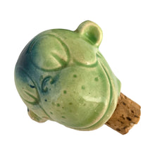 Load image into Gallery viewer, Rare vintage art deco figural smiling and wide eyed seated monkey ceramic long neck flask or decanter, glazed in green and navy blue. Crafted by Schafer and Vater, Germany, circa 1930s. This decanter is reminiscent of a Dr. Seuss-like character, and would be a statement piece for any barware collection! In excellent condition. Crazing present. Measures 2 1/2 x 3 x 10 inches tall