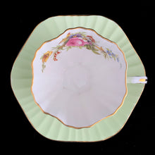 Load image into Gallery viewer, Overhead view of EB Foley 1850 bone china teacup and saucer showing mint green rose bouquet and gold gilt rim, Pattern 3627
