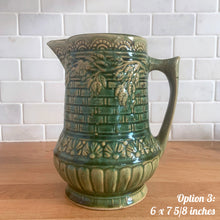 Load image into Gallery viewer, Antique vintage art deco gloss green Rosella 320 ceramic yellow ware pitcher featuring climbing roses on a basketweave pattern. Crafted by Robinson Clay Product Company, the precursor to Robinson Ransbottom Pottery, USA, early 1900s. A beautiful piece to add to your art pottery collection! Option 3: 6 x 7 5/8 inches. In excellent vintage condition, no chips/cracks/repairs, age-related crazing. Typical manufacturing glaze pops. Unmarked.