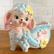 Load image into Gallery viewer, Bring a touch of vintage charm to your space with this anthropomorphic happy lamb planter, featuring soft pastel details, sculpted curls, and delicate floral accents. Crafted by Rubens Originals, Japan, 1950s. This whimsical planter is perfect for adding personality to shelves, windowsills, nurseries or as a baby shower gift.