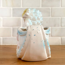 Load image into Gallery viewer, Bring a touch of vintage charm to your space with this anthropomorphic happy lamb planter, featuring soft pastel details, sculpted curls, and delicate floral accents. Crafted by Rubens Originals, Japan, 1950s. This whimsical planter is perfect for adding personality to shelves, windowsills, nurseries or as a baby shower gift.