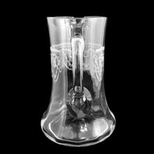 Load image into Gallery viewer, Handle view of Heisey No. 3350 glass pitcher showing applied handle construction and needle-etched Trefoil tatting pattern on flared cylinder form