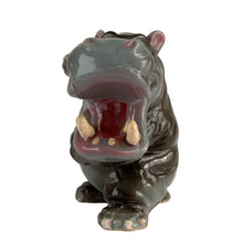 Load image into Gallery viewer, Vintage mid-century anthropomorphic hippopotamus ceramic shaker with cork stopper. Kreiss, Japan 1950s. Add this adorable and highly collectible shaker to your collection!
In excellent vintage condition, no chips/cracks/repairs. Maker's mark on bottom.
Measures 3 3/4 x 2 3/4 x 4 inches