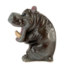 Load image into Gallery viewer, Vintage mid-century anthropomorphic hippopotamus ceramic shaker with cork stopper. Kreiss, Japan 1950s. Add this adorable and highly collectible shaker to your collection!
In excellent vintage condition, no chips/cracks/repairs. Maker's mark on bottom.
Measures 3 3/4 x 2 3/4 x 4 inches
