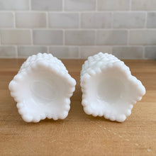 Load image into Gallery viewer, Pair of vintage "Hobnail" milk glass salt and pepper shakers (#3609) with metal lids. Crafted by Fenton Art Glass, USA, 1970 - 2012. Add a bit of charm and elegance to your table with these beauties! In excellent condition, free from chips. Chrome is intact. Each shaker measures 1 3/4 x 3 1/2 inches