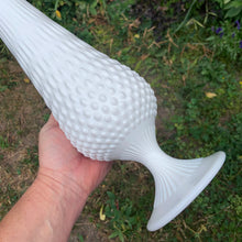 Load image into Gallery viewer, Close up view of a vintage "Hobnail" milk glass swung vase showing the hobnail and foot details. Fenton Art Glass, USA, circa 1960s.