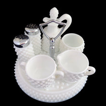 Load image into Gallery viewer, This rare vintage "Hobnail" milk glass condiment set features a round tray with silver-toned handle, salt and pepper shakers, cruet with stopper, creamer, open sugar and jam pot. A classic piece of American glass history to add to your collection! In overall excellent condition for a set of this age. Absent from this set are the lid and spoon for the jam pot. The lid on one of the shakers has damage in one spot where the chrome finish has come away (see photos).