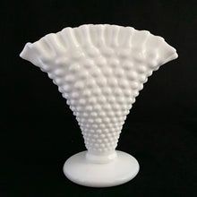 Load image into Gallery viewer, This pretty vintage Hobnail milk glass footed fan vase is the epitome of simple elegance. Crafted by Fenton Art Glass. Unmarked, pre-1970. A classic vase that never goes out of style!
In excellent condition, no chips.
Measures 6 x 3 x 5 3/4 inches