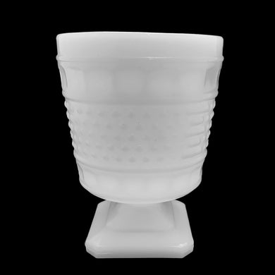 This beautiful, simple and elegant vintage milk glass planter features a hobnail design bordered with thumbprint bands atop a square pedestal, shape #1180. Produced by Napco Glass, circa 1960/70s. This planter is the perfect vessel for greenery, flowering plants or even repurse as a pen or paintbrush holder. Ideal cottage, shabby chic or wedding decor. You can't go wrong with this classic piece!  In excellent condition, no chips or cracks.  Measures 4 1/4 x 5 1/2 inches   