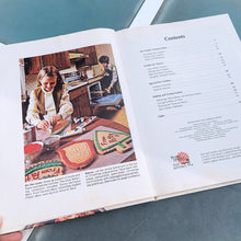 Load image into Gallery viewer, Better Homes and Gardens is known for its fabulous cookbooks. This hardcover cookbook focuses on homemade cookie recipes. Its 96 pages are filled with amazing recipes along with many colour photographs. Originally published by Meredith Corporation, USA, 1975. This is the large format edition, fifth printing, 1984. In great vintage condition with normal age-related yellowing.