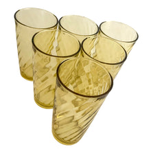Load image into Gallery viewer, Set of six vintage honey gold swirl optic glass tumblers. Crafted by Continental Can Company, USA, 1960s. Add a touch of colour to your everyday drinkware with these retro glasses!
In excellent condition, no chips.
Measures 2 3/4 x 5 inches
Capacity 12 ounces