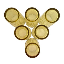 Load image into Gallery viewer, Set of six vintage honey gold swirl optic glass tumblers. Crafted by Continental Can Company, USA, 1960s. Add a touch of colour to your everyday drinkware with these retro glasses!
In excellent condition, no chips.
Measures 2 3/4 x 5 inches
Capacity 12 ounces