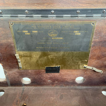 Load image into Gallery viewer, Interior identification plate marked His Master’s Voice Limited, with serial number and radio specifications