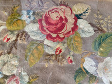 Load image into Gallery viewer, Detail of a red and cream needlepoint rose surrounded by pale blue flowers and green and gold leaves