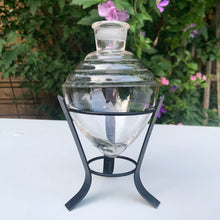 Load image into Gallery viewer, Vintage chemistry inverted beehive beaker and metal stand. Crafted by Owens, USA, 1950s. Salvaged from the estate of the former Dale Pharmacy on Queen St. East in Toronto Canada. This decorative piece of pharmaceutical history would make a unique bud vase! In excellent condition, no chips. Overall measures 3 5/8 x 7 1/8 inches
